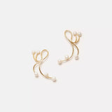 the-constellation-of-love-earrings-albert-coll-800836.jpg